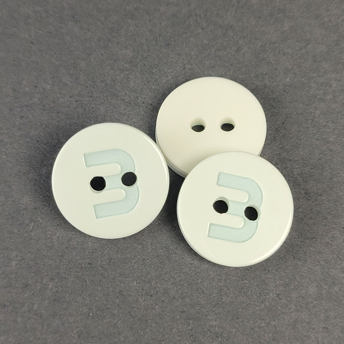 100.782 - BOTÃO COM 12 UN.