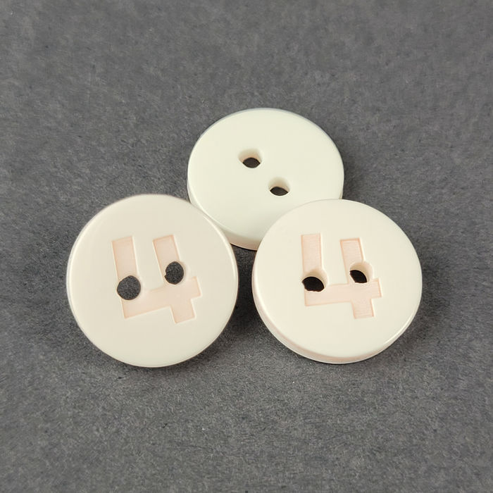 100.773 - BOTÃO COM 12 UN.