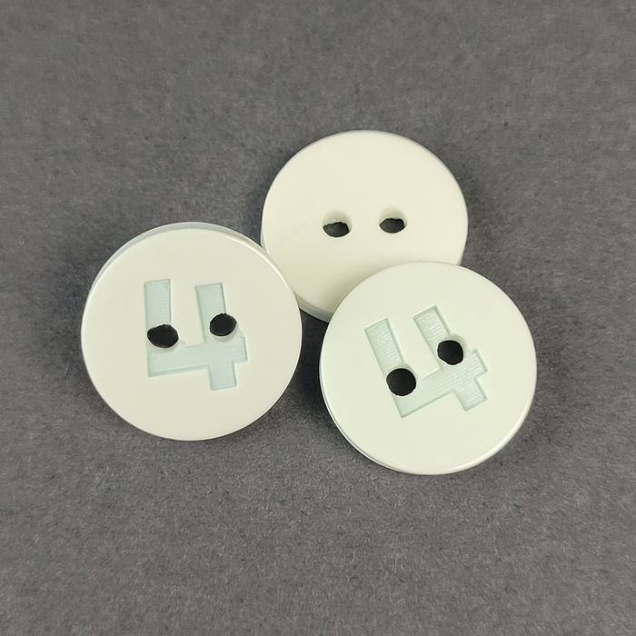 100.783 - BOTÃO COM 12 UN.