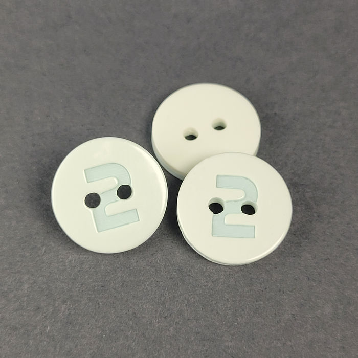 100.781 - BOTÃO COM 12 UN.