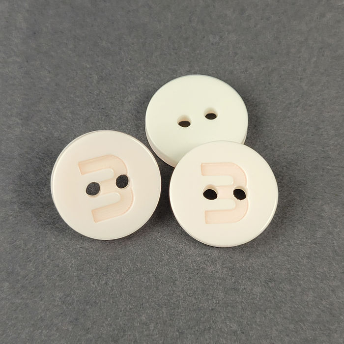 100.772 - BOTÃO COM 12 UN.