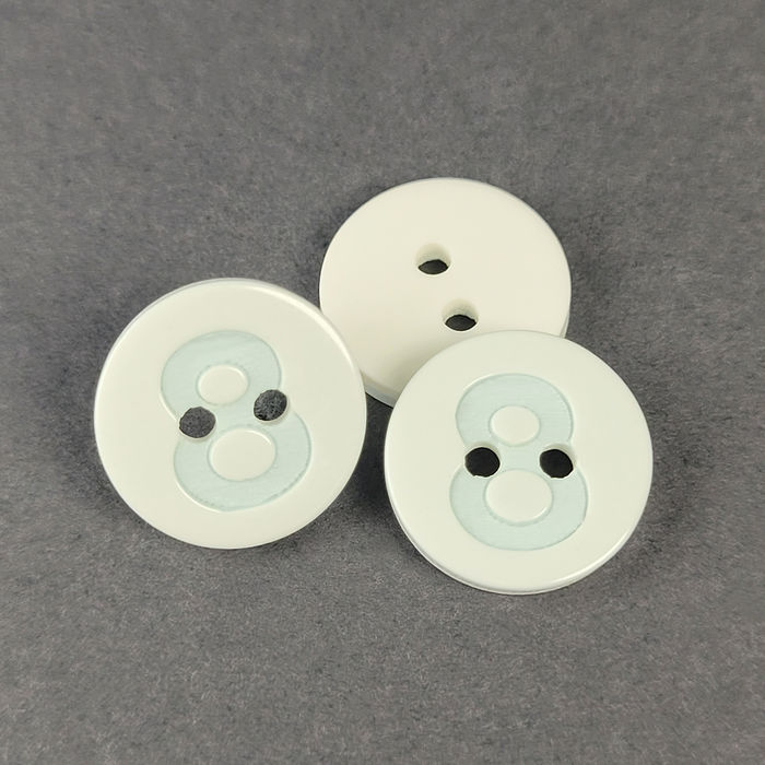 100.787 - BOTÃO COM 12 UN.