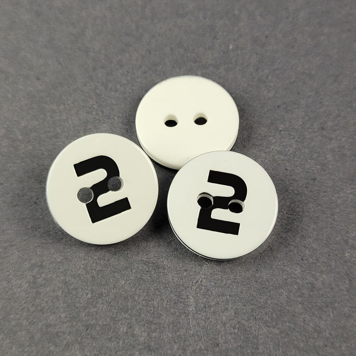 100.801 - BOTÃO COM 12 UN.