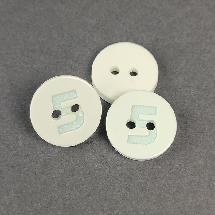 100.784 - BOTÃO COM 12 UN.