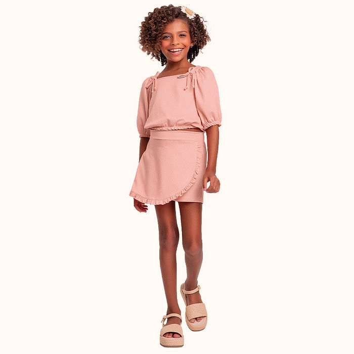 Conjunto blusa/short saia em malha favo com laço decorativo