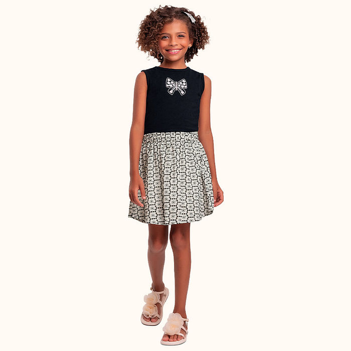 Conjunto regata em cotton leve e short saia em tecido com bordado