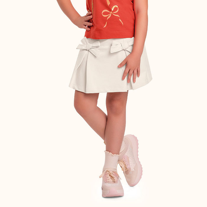 Short-saia em moletinho com laço decorativo