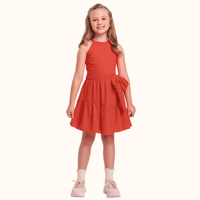 Conjunto regata em cotton leve e short saia em tecido brilho