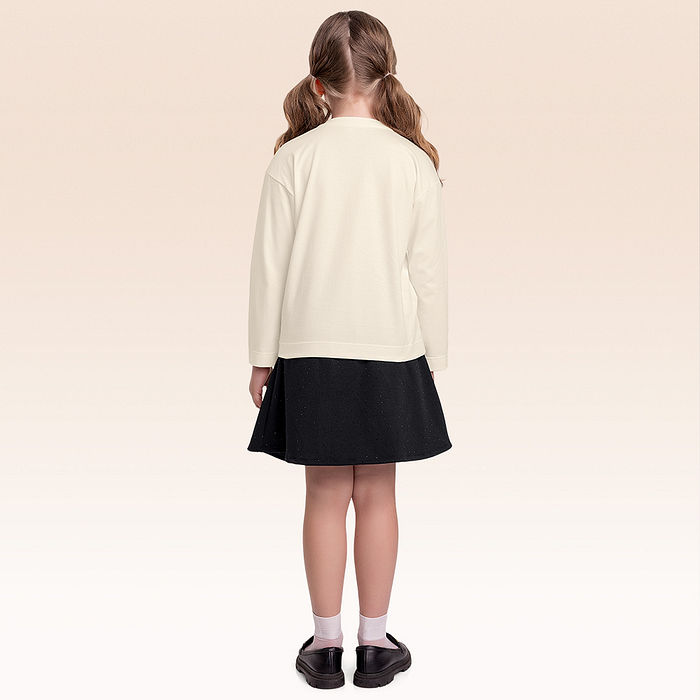 Conjunto blusa manga longa e shorts saia