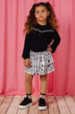 Conjunto blusa de malha e saia estampada Conjunto blusa de malha e saia estampada