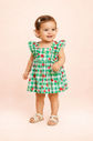 Vestido baby com estampa xadrez e cerejas Vestido baby com estampa xadrez e cerejas