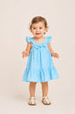 Vestido listrado com detalhe de laço frontal Vestido listrado com detalhe de laço frontal