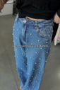 CALÇA JEANS WIDE LEG COM APLIQUE EM PÉROLAS