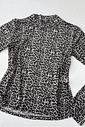 Blusa de tule animal print onça Blusa de tule animal print onça