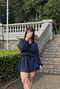 Macaquinho vestido com manga longa em chiffon azul Macaquinho vestido com manga longa em chiffon azul
