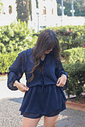 Macaquinho vestido com manga longa em chiffon azul Macaquinho vestido com manga longa em chiffon azul