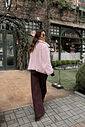 calça pantalona feminina em alfaiataria com cintura alta e elástico nas costas, caimento fluido que não marca o corpo, modelagem ampla com pernas soltas e bolsos laterais funcionais