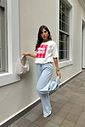 T-SHIRT ESTONADA VENICE BEACH ESTAMPA ROSA OFF WHITE T-SHIRT ESTONADA VENICE BEACH ESTAMPA ROSA OFF WHITE