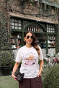 t shirt feminina preta com estampa exclusiva frontal, modelagem clássica e caimento confortável, camiseta de algodão versátil para uso diário