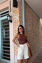 body feminino em poliamida com modelagem ajustada, frente e costas duplas, zero transparência, design nadador e fechamento por botões de pressão, peça confortável e versátil