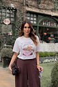 t shirt feminina preta com estampa exclusiva frontal, modelagem clássica e caimento confortável, camiseta de algodão versátil para uso diário