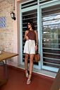 body feminino em poliamida com modelagem ajustada, frente e costas duplas, zero transparência, design nadador e fechamento por botões de pressão, peça confortável e versátil