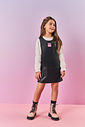 CONJ BLUSA ML E SALOPETE NATURAL/PRETO