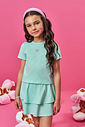 Conjunto Infantil com Blusa e Saia Shorts em Malha Botonê – Look Menina Verão com Algodão VERDE BRISA