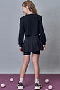 Conjunto de blusa cropped em meia malha e saia em poliamida com shorts embutido 92286 Lilimoon Teen Menina