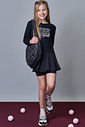 Conjunto de blusa cropped em meia malha e saia em poliamida com shorts embutido 92286 Lilimoon Teen Menina