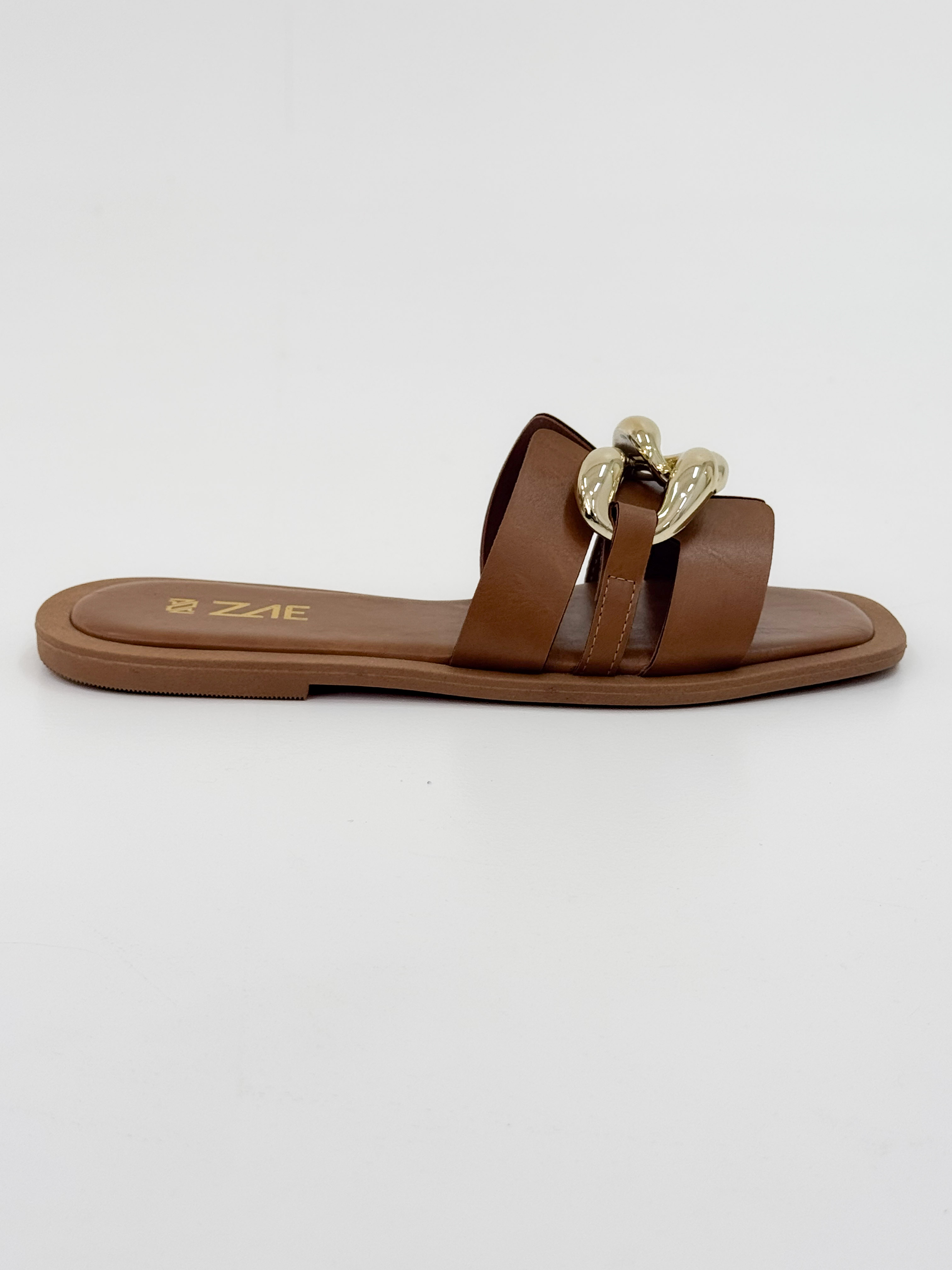 Clau — Chinelo Rasteira Canela com Detalhe Ouro Clau — Chinelo Rasteira Canela com Detalhe Ouro