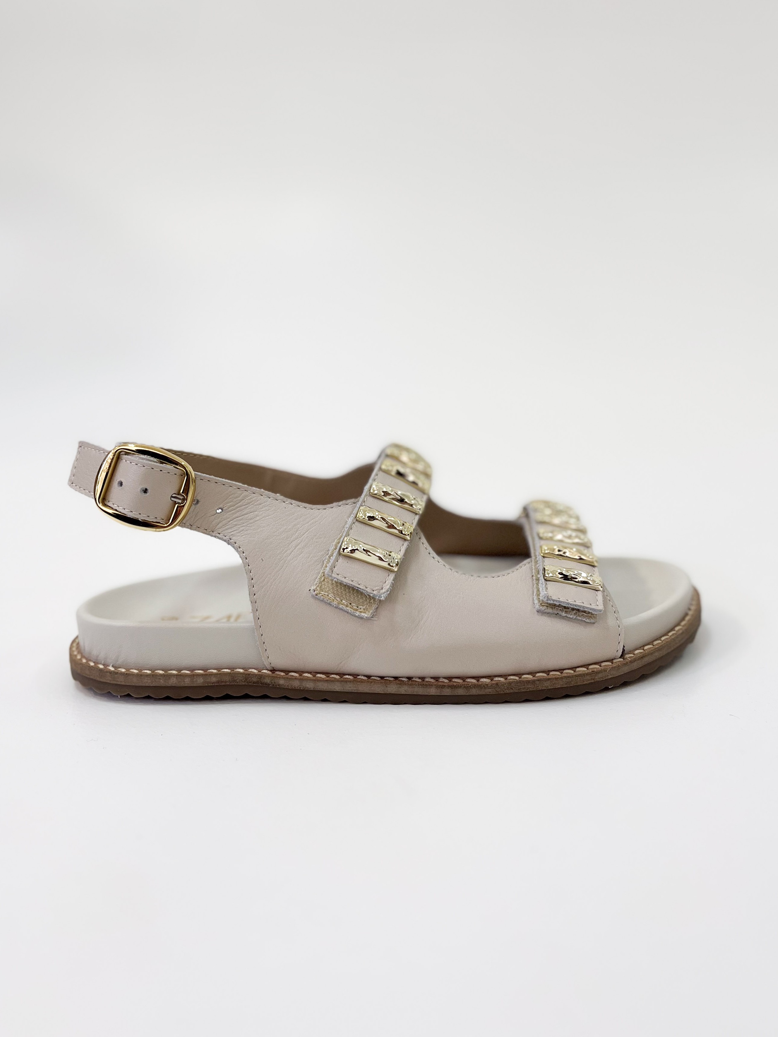 Zaza - Sandália Rasteira em Couro Off White com Tiras Douradas e Fivela Ajustável Zaza - Sandália Rasteira em Couro Off White com Tiras Douradas e Fivela Ajustável