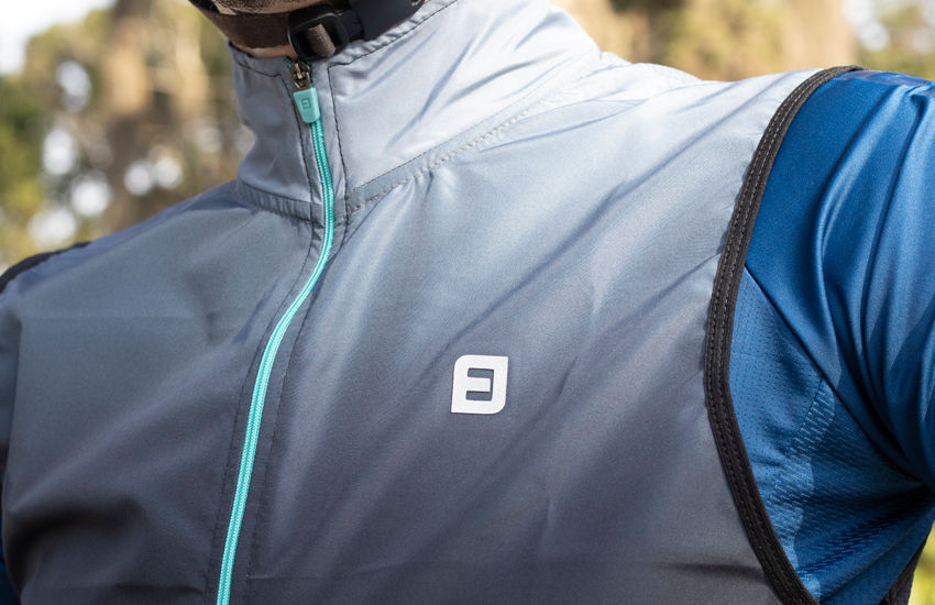 Banner Aprimorado o Desempenho e o Conforto: A Importância do Colete Corta-Vento de Ciclismo