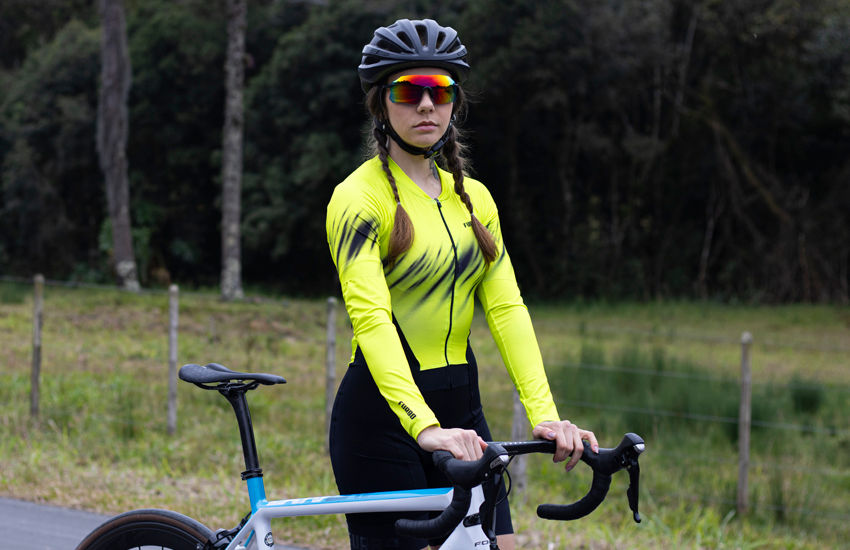 Banner Macaquinho Feminino Alive com Manguito: estilo e performance para ciclistas