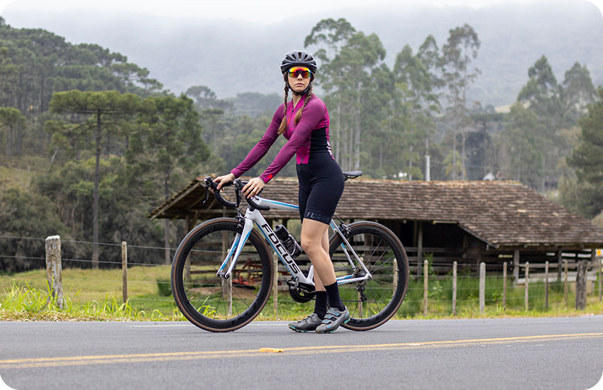 macaquinho ciclismo feminino roxo