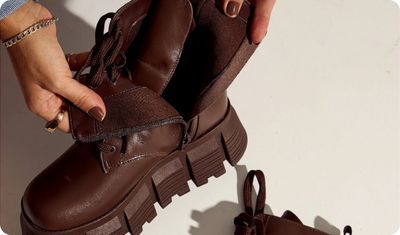 Detalhe couro premium Julieta Marrom